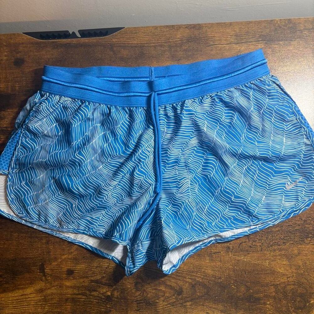 Nike blue shorts with white